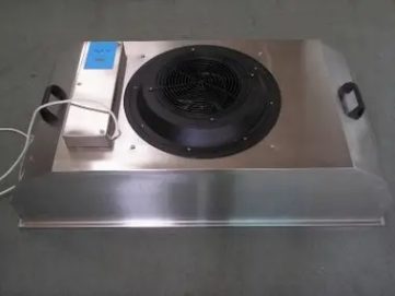 Close-up of industrial filter with connector ports